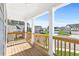 Balcony with a wooden railing offers neighborhood views at 411 Riverclub Rd, Acworth, GA 30101
