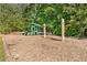 A full view of the community playground with a slide and swings at 411 Riverclub Rd, Acworth, GA 30101