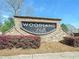 Welcome to Woodland Hills, a community with a beautiful entrance and friendly neighbors, in this image at 4575 Birch Way, Loganville, GA 30052