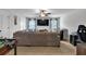 Living room with a sectional sofa, a TV, a foosball table, and natural light at 4575 Birch Way, Loganville, GA 30052