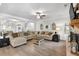 Bright and airy living room featuring hardwood floors, and a fireplace at 4575 Birch Way, Loganville, GA 30052