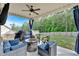 Outdoor patio features a fire pit, comfortable seating, a grill and backyard views at 4575 Birch Way, Loganville, GA 30052