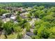 Aerial view shows a residential area with lush trees surrounding properties at 957 Harwell Nw St, Atlanta, GA 30314