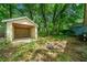 A backyard shed and lush foliage are featured in this photo at 957 Harwell Nw St, Atlanta, GA 30314