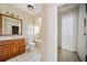 Bathroom with single sink vanity, toilet, tub/shower and closet at 957 Harwell Nw St, Atlanta, GA 30314