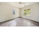 Empty bedroom features wood-look laminate flooring and a ceiling fan at 957 Harwell Nw St, Atlanta, GA 30314