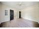 Empty bedroom showing flooring, doors, and a ceiling fan at 957 Harwell Nw St, Atlanta, GA 30314