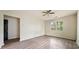 Empty living room featuring wood-look laminate flooring and one window at 957 Harwell Nw St, Atlanta, GA 30314