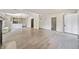 View of the living room with fireplace flowing into the dining room and front door at 957 Harwell Nw St, Atlanta, GA 30314
