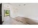 Bright living room features hardwood floors and outdoor access at 957 Harwell Nw St, Atlanta, GA 30314
