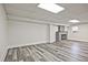 Finished basement featuring a fireplace and modern flooring, creating a cozy retreat at 4701 Flat Shoals Rd # 35E, Union City, GA 30291