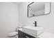 Modern bathroom featuring a vessel sink, marble countertop, and sleek black fixtures at 4701 Flat Shoals Rd # 35E, Union City, GA 30291
