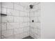 Modern bathroom shower featuring marble-style tile and a rainfall shower head at 4701 Flat Shoals Rd # 35E, Union City, GA 30291