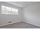 Bright bedroom featuring natural light and carpet, providing a welcoming atmosphere at 4701 Flat Shoals Rd # 35E, Union City, GA 30291