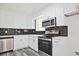 Recently remodeled kitchen with stainless steel appliances, subway tile backsplash, and plenty of counter space at 4701 Flat Shoals Rd # 35E, Union City, GA 30291