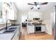 Well-lit kitchen with stainless steel appliances and a tile backsplash at 522 Knollwood Dr, Stockbridge, GA 30281