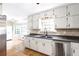Modern kitchen with stainless steel appliances and ample cabinet space at 522 Knollwood Dr, Stockbridge, GA 30281
