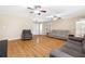 Bright living room with hardwood floors and views of multiple entryways at 522 Knollwood Dr, Stockbridge, GA 30281