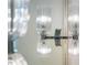 Close-up of modern bathroom sconces with mirrored reflection at 2515 Habersham Rd, Atlanta, GA 30305