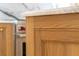 Close up on custom wood cabinets with marble countertops and stainless-steel appliances in the kitchen at 2515 Habersham Rd, Atlanta, GA 30305