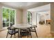 Stylish dining area leads to a cozy sitting area featuring a fireplace at 2515 Habersham Rd, Atlanta, GA 30305