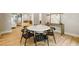 Open dining area with hardwood floors and seamless flow to other living spaces at 2515 Habersham Rd, Atlanta, GA 30305