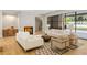 Bright living room features a fireplace and large windows offering plenty of natural light at 2515 Habersham Rd, Atlanta, GA 30305