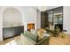 Cozy living room with a fireplace and wet bar, perfect for relaxing and entertaining at 2515 Habersham Rd, Atlanta, GA 30305