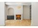 Open living space boasts a fireplace, a wet bar and a modern chandelier that add charm and character at 2515 Habersham Rd, Atlanta, GA 30305