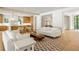 Spacious open floorplan combining kitchen, living, and dining areas with hardwood floors at 2515 Habersham Rd, Atlanta, GA 30305