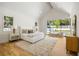 Bright main bedroom with high ceilings, large windows, and stylish decor at 2515 Habersham Rd, Atlanta, GA 30305