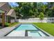 Beautiful swimming pool with integrated hot tub and clean landscaping at 2515 Habersham Rd, Atlanta, GA 30305