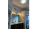 Bathroom featuring a double sink vanity with bright lighting at 500 Kings Pl, Riverdale, GA 30296