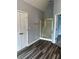 Bright bathroom with glass shower, closet, and modern fixtures at 500 Kings Pl, Riverdale, GA 30296