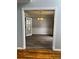 Dining room with decorative molding, luxury vinyl plank flooring, and chandelier at 500 Kings Pl, Riverdale, GA 30296