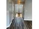 Entryway with hardwood floors and neutral walls leading to the living areas at 500 Kings Pl, Riverdale, GA 30296