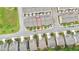 Aerial view of property featuring multi-Gathering homes, street, and green spaces at 614 Harrington Hls, Decatur, GA 30032