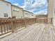 Back deck area with wooden railings looking over backyard and lower garage entry at 614 Harrington Hls, Decatur, GA 30032