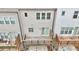 Backyard view from above featuring wood decks, patios, and fenced yard at 614 Harrington Hls, Decatur, GA 30032