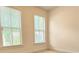 Bright bedroom with white trim windows and cream walls at 614 Harrington Hls, Decatur, GA 30032