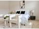 Serene bedroom featuring neutral tones, a plush rug, and elegant bedside decor at 614 Harrington Hls, Decatur, GA 30032