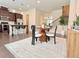 Open floorplan with modern kitchen and dining area featuring a round table and stylish chairs at 614 Harrington Hls, Decatur, GA 30032
