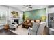 Stylish living room featuring a decorative wall, fireplace, and modern furniture at 1098 Caruso Dr, Buford, GA 30518