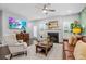 Spacious living room boasts a fireplace, large windows, and a comfortable seating arrangement at 1098 Caruso Dr, Buford, GA 30518