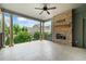 Spacious outdoor balcony with brick fireplace and view of community and trees at 1112 Cordia Nw Ave, Atlanta, GA 30318