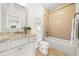 Well-lit bathroom with granite countertops, neutral tile, and a shower over tub at 1112 Cordia Nw Ave, Atlanta, GA 30318