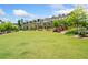 Expansive green space with manicured lawn, lush landscaping, and benches, perfect for recreation at 1112 Cordia Nw Ave, Atlanta, GA 30318