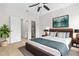 The primary bedroom with backyard views offers a serene retreat with decor and a modern design at 1112 Cordia Nw Ave, Atlanta, GA 30318