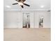 Carpeted main bedroom with views into the main bathroom at 1112 Cordia Nw Ave, Atlanta, GA 30318