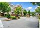 Inviting street showcasing well-maintained townhomes with lush landscaping and gated entrance at 1112 Cordia Nw Ave, Atlanta, GA 30318